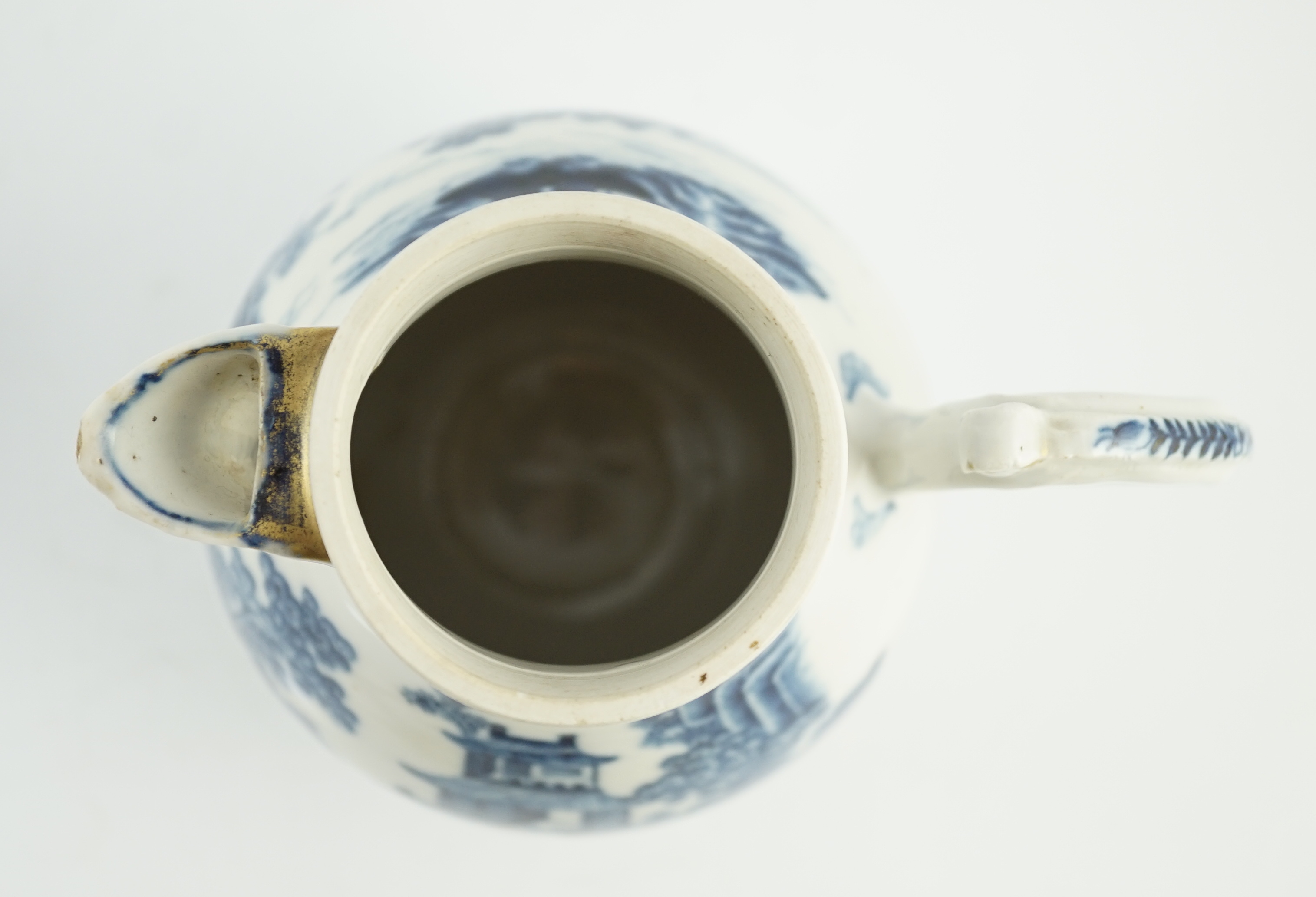 A Chinese blue and white jug and cover, Qianlong period, later metal finial